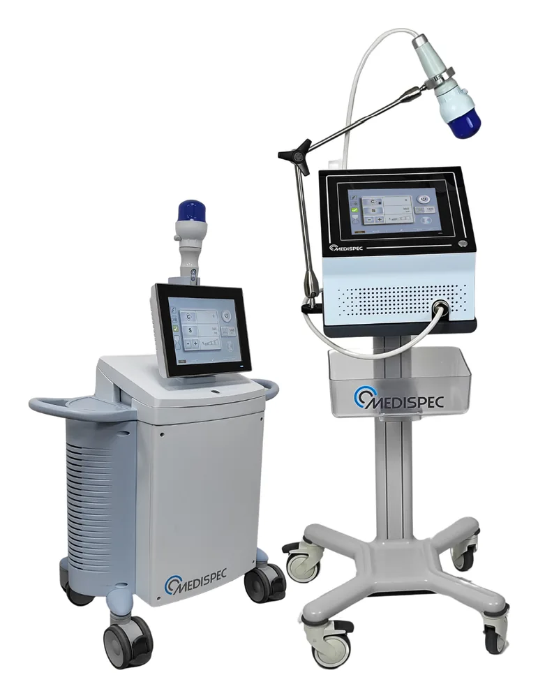 Medispec Orthospec Compact on wheels beside the Orthospec Desktop on a mobile stand