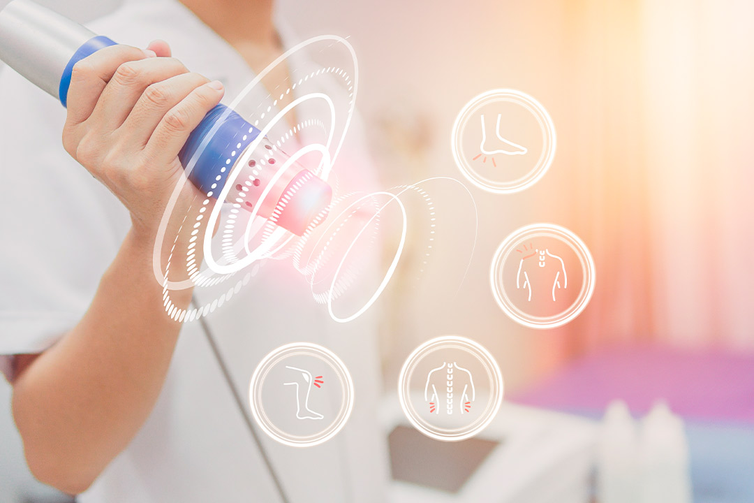 Individual using a laser device (Shockwave machine) with icons, representing strategies for optimizing patient flow in clinics during Thanksgiving.