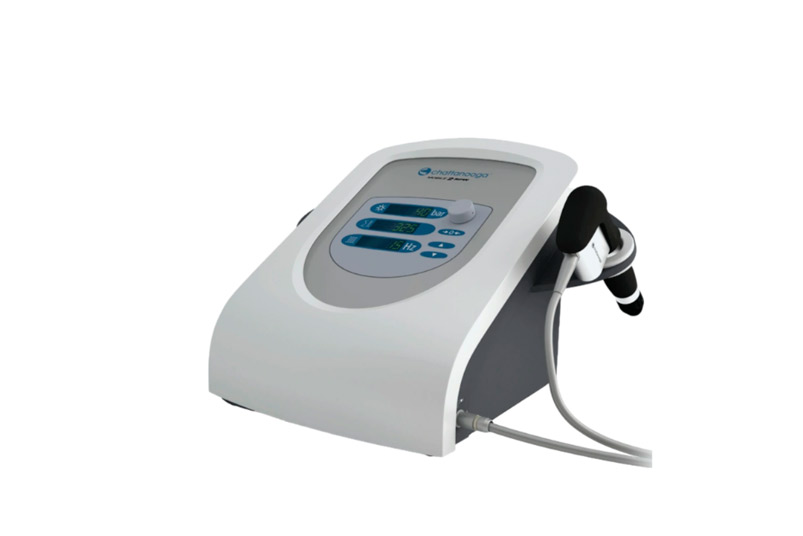 Black and white shockwave machine with a cord, highlighted in the 2026 Buyers Guide for Clinics.