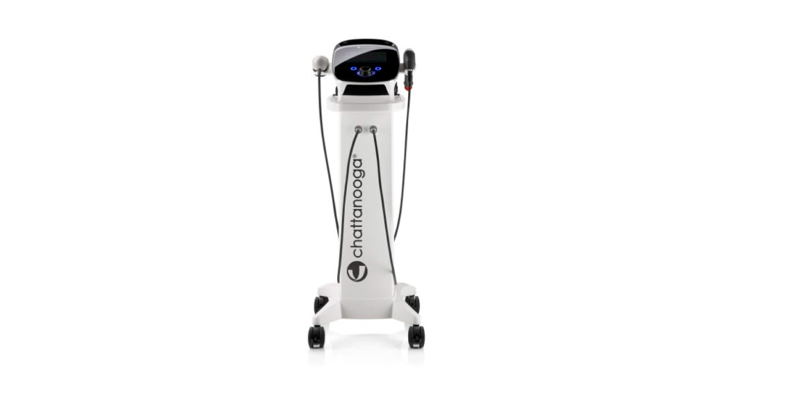 A leasing shockwave machine featuring a white and black design with a prominent black head, intended for clinic use.
